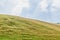 Green grass hills on the Transalpina road, Parang Mountains