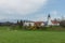 Green grass and mountains cute village