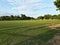 Green grass Playground in India,  village playground in India,  Indian football playground.