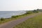 Green Grass and Trail at Long Wharf Park along the Shore of New Haven Harbor in New Haven Connecticut