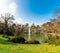 Green grass by world famous Crystal palace in Madrid