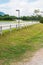 Green grass yard with bicycle lane