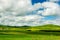 The green grassland and beautiful cloudscape