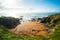 Green grassland with blue sky. The coast of New Zealand. Seal colony. I