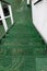Green Grated Stairs of Companionway Leading To Lower Deck