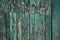 Green gray wooden texture from old frayed fence boards