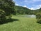 Green ground with a small lake