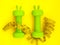 green heavy dumbbells in shape of easter bunny and yellow tape measure on yellow background. Easter nutrition, fitness