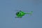 Green Helicopter in flight