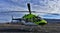 Green Helicopter on landing strip