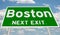 Green highway sign for Boston next exit