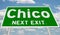 Green highway sign for Chico next exit
