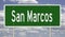 Green highway sign for San Marcos