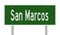 Green highway sign for San Marcos