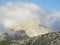 Green hills of Apennine Mountain Range in clouds