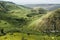 Green Hills with Blooming Wild Flowers and Rural Path in Spring. Viewpoint of Pure Nature Hiking Trail. El Al Reserve, Israel