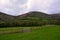 Green hills and a rural farm near Black Mountains, Brecon Beacons , Wales, UK