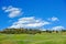 Green hillside and blue sky