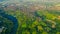 Green hilly landscape and small town