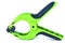 Green insulated clamp on white background