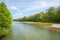 Green isar river with gravel banks, beautiful spring landscape