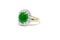 Green jade with diamond and gold ring isolated