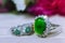 Green jade oval gemstone rare colour Dark green floating ring with diamond round