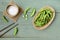 Green Japanese Soybean in wooden bowl on table wood