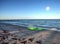 Green kayak on the white sand of Tigertail Beach in Marco Island