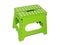 Green kids chair with white dots
