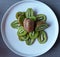 Green Kivi on plate ,healthy fruits vitamin