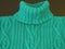 Green knitting jumper