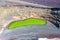 Green lake aerial view Charco de Los Clicos Verde near El Golfo on Lanzarote island on Canary Islands in Spain