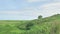 Green landscape view of Nothern Spain countryside, hills covered with grass at sunny summertime day