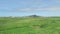 Green landscape view of Nothern Spain countryside, hills covered with grass at sunny summertime day