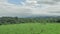 Green landscape view of Nothern Spain countryside, hills covered with grass at sunny summertime day