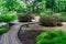 Green lawn in a colorful landscaped formal garden.