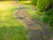 green lawns with bricks pathways, A fresh green lawn in the park, landscape design