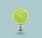 Green Lemon light bulb on bright blue background. Summer fun concept