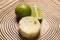 green lemon tart and mint on wooden background