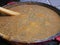 Green lentils cooking in a saucepan