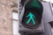 Green light for pedestrian on semaphore in the city