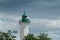 green lighthouse in La Rochelle Harbor in France