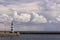 A green lighthouse in Nida by the port of the Curonian lagoon