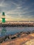 The green lighthouse on the pier in Warnemuende