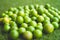 Green Lime pile on artificial grass