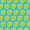 Green lime slices pattern on vibrant turquoise background