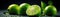 Green Limes Metallic Droplets Standing Black Matte Background Panoramic Banner. Generative AI