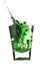 Green liquid splash in shot glass