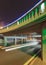 Green lit underpass with traffic in motion blur, Beijing night-time, China